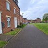 Photo 1: Front Of House With Spacious Green 