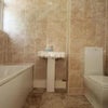 Photo 5: First Floor Bath + Toilet