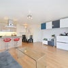 Photo 5: shared living room and kitchen