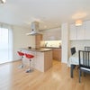 Photo 3: Kitchen area with storage 