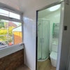 Photo 6: Downstairs shower/toilet