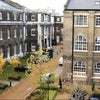 Photo 3: Gated courtyard