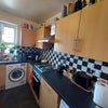 Photo 9: Kitchen with table & chairs