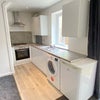 Photo 2: Kitchen area 