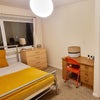 Photo 2: Room available with inbuilt wardrobe, desk storage and chest of drawers