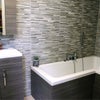 Photo 8: Yes, there's also a toilet next to the bath/shower