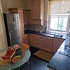 Photo 2: Kitchen and dining area