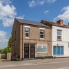 Photo 5: Front of flats