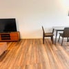 Photo 8: Tv and dining table
