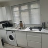 Photo 8: washing machine and fridge included