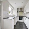 Photo 8: Newly renovated kitchen with plenty of personal and communal storage space