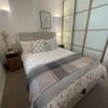Photo 4: Double bedroom with built in storage