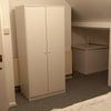 Photo 2: Wardrobe and desk