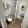 Photo 5: Recently re-floored bathroom with power shower