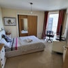Photo 1: Doublebedroom with bed and work desk
