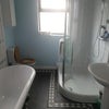 Photo 5: Shared bathroom.