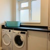 Photo 7: Utility room: with washing machine and tumble drier.