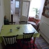 Photo 2: Shared dining room. Kitchen beyond