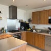 Photo 4: Kitchen with fridge, microwave, oven and dishwasher