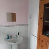 Photo 8: The bathroom features a convenient cupboard