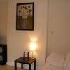 Photo 4: Cosy reception room