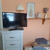 Photo 6: T V and new chest of draws from Baker and Stonehouse