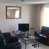 Photo 5: Living room (with our stuff)