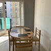 Photo 3: Very light living room opening onto balcony