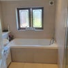 Photo 4: Bathroom [shower on right]
