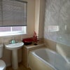 Photo 3: The private shower room and bath with the room 