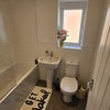 Photo 3: En-suite with electric shower 