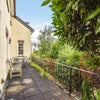 Photo 3: Access to balcony and garden