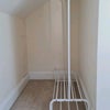 Photo 6: L-Shape room offer a storage area with clothes rail