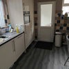 Photo 5: Shared kitchen with Washer/Dryer, dishwasher, range cooker, combi-microwave and espresso maker.