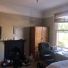 Photo 2: The room is street facing comes with the two closets