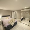 Photo 2: The other side of the room showcasing 1.5m wardrobe with mirrored doors