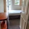 Photo 6: Ground Floor Bedroom, double bed, patio doors to garden