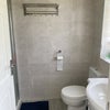 Photo 6: Shared downstairs shower room 