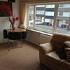 Photo 1: Shared living room 