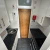Photo 6: kitchen - space for under counter fridge (not included)