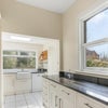 Photo 3: Bright kitchen overlooking garden.  Marble worktops