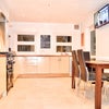 Photo 5: Great Size Communal Kitchen with TV with Appliances