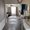 Photo 4: Stylish Dining area with a flowery wall papers 