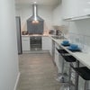 Photo 4: Kitchen dining area (pre refurb)