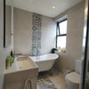 Photo 2: Shared Bathroom 