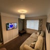 Photo 1: Lounge with flatscreen and two sofas