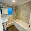 Photo 5: Upstairs full bathroom 