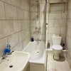 Photo 2: Downstairs full bathroom 