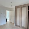 Photo 9: Bedroom with build in wardrobe