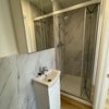 Photo 3: Both rooms are ensuite with toilet, basin, mirror cabinet, and large shower